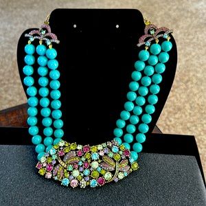 Heidi Daus breaded dragonfly necklace. The stones in this piece are stunning!